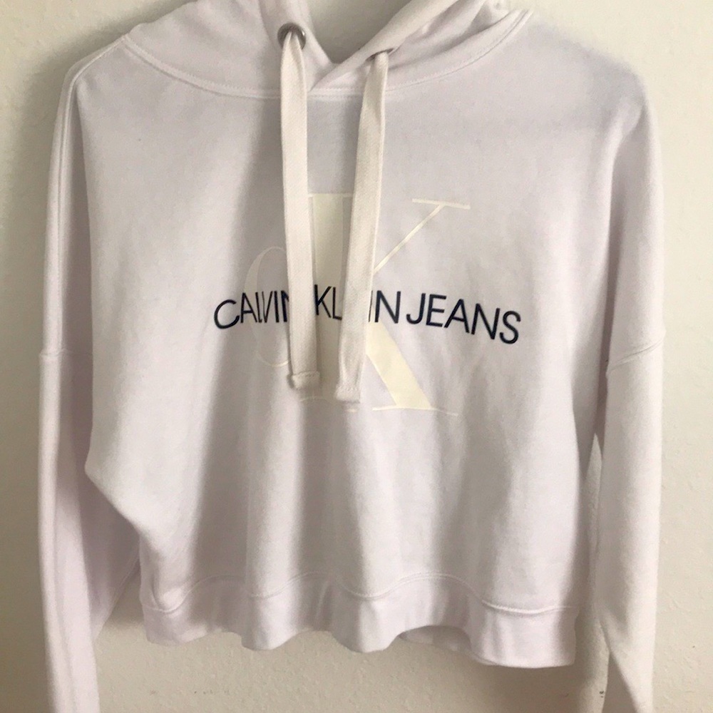A white Calvin Klein Jeans logo hoodie